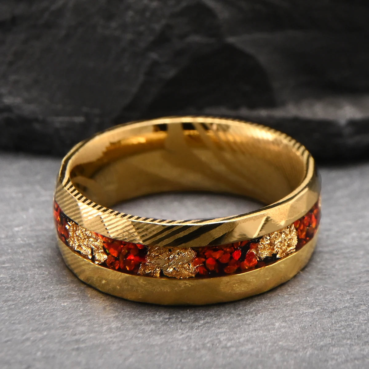 Sol Invictus – Damascus Steel Ring with Red Opal & 18K Gold Foil